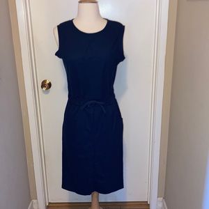 Woman’s navy blue sleeveless dress